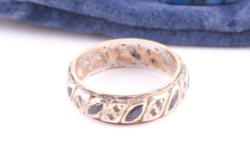 Lot 71 - A 9ct white gold and paste stone eternity ring,...