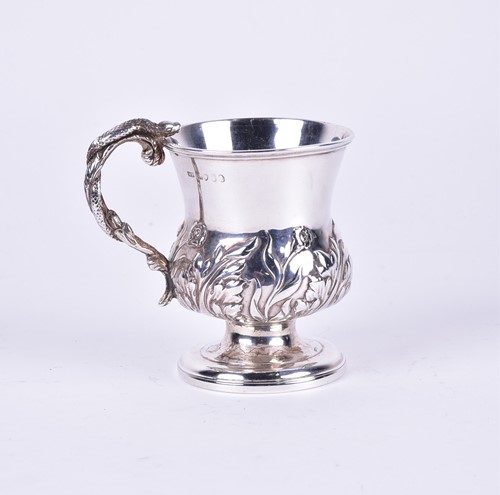 Lot 405 - A late Georgian silver cup, embossed floral...