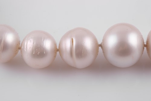 Lot 341 - Attributed to Andrew Grima. A South Sea pearl...