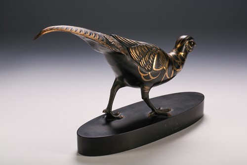 Lot 121 - A patinated bronze pheasant, 20th century, the...