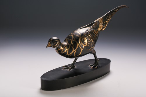 Lot 121 - A patinated bronze pheasant, 20th century, the...