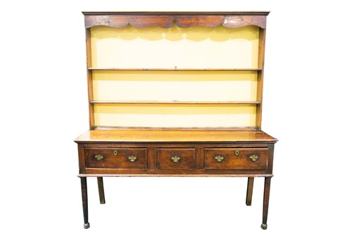 Lot 81 - An early 19th century stained pine three...