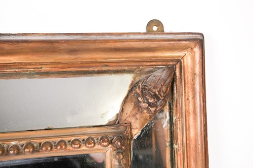 Lot 103 - A 19th-century gilt bevel framed wall mirror...