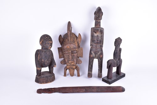 Lot 129 - Five items of 20th century tribal art,...