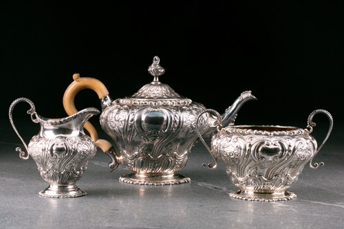 Lot 329 - A Victorian composite three piece silver tea...