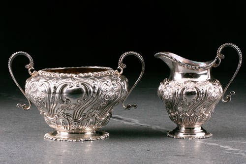 Lot 329 - A Victorian composite three piece silver tea...