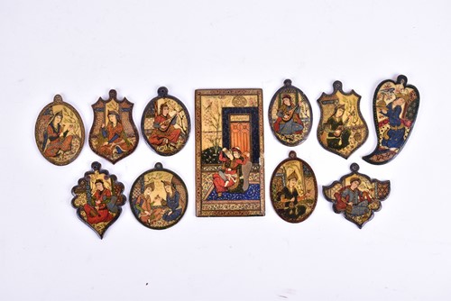 Lot 253 - A collection of nine Persian Qajar dynasty...