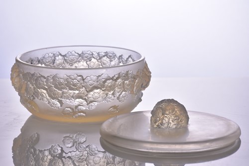 Lot 168 - A Lalique "Primaveres" pattern circular powder...