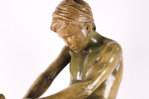 Lot 176 - A Goldscheider terracotta figure of a young...