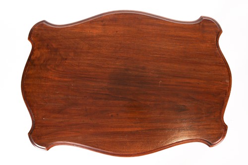 Lot 88 - A French Louis XV Style walnut cartouch topped...