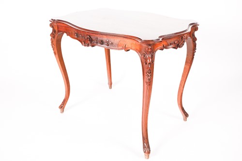 Lot 88 - A French Louis XV Style walnut cartouch topped...