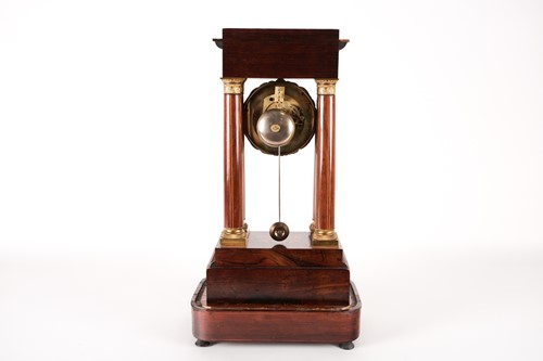 Lot 206 - A French Charles X rosewood portico clock...