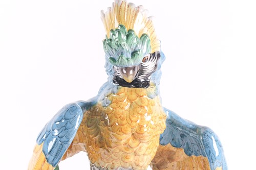 Lot 284 - A large Continental ceramic model of a parrot,...