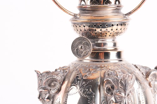 Lot 365 - A 19th-century silver plated through draft oil...