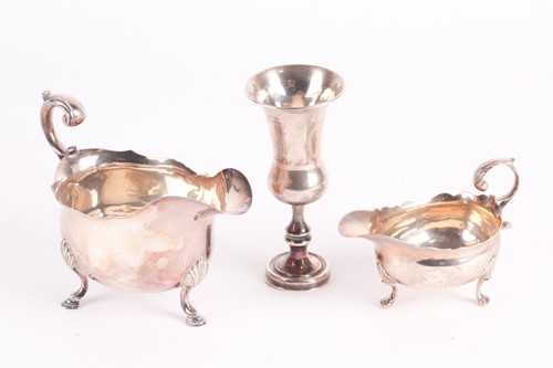 Lot 309 - A George II silver sauceboat. London 1750...