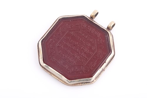 Lot 77 - An Indo Persian red hardstone octagonal...
