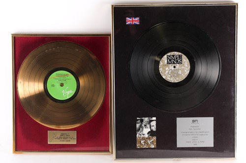 Lot 309 - Simple Minds: a framed presentation gold disc...