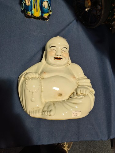 Lot 112 - A Chinese part biscuit porcelain figure of...