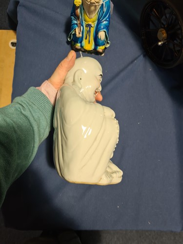 Lot 112 - A Chinese part biscuit porcelain figure of...