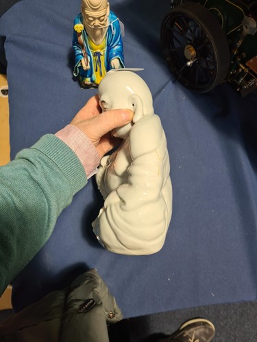 Lot 112 - A Chinese part biscuit porcelain figure of...