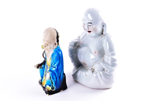 Lot 112 - A Chinese part biscuit porcelain figure of...
