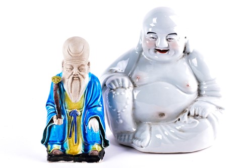 Lot 112 - A Chinese part biscuit porcelain figure of...
