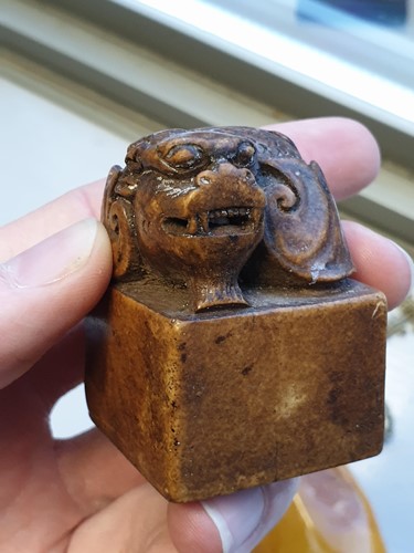 Lot 124 - Three Chinese jade seals, a small jade carving...