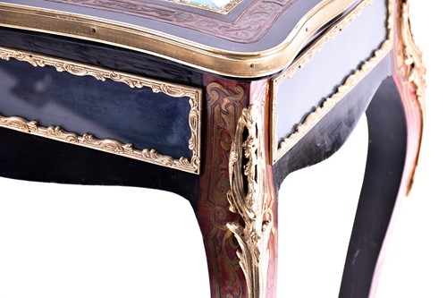 Lot 160 - A French Napoleon III ebonized and red Boulle...