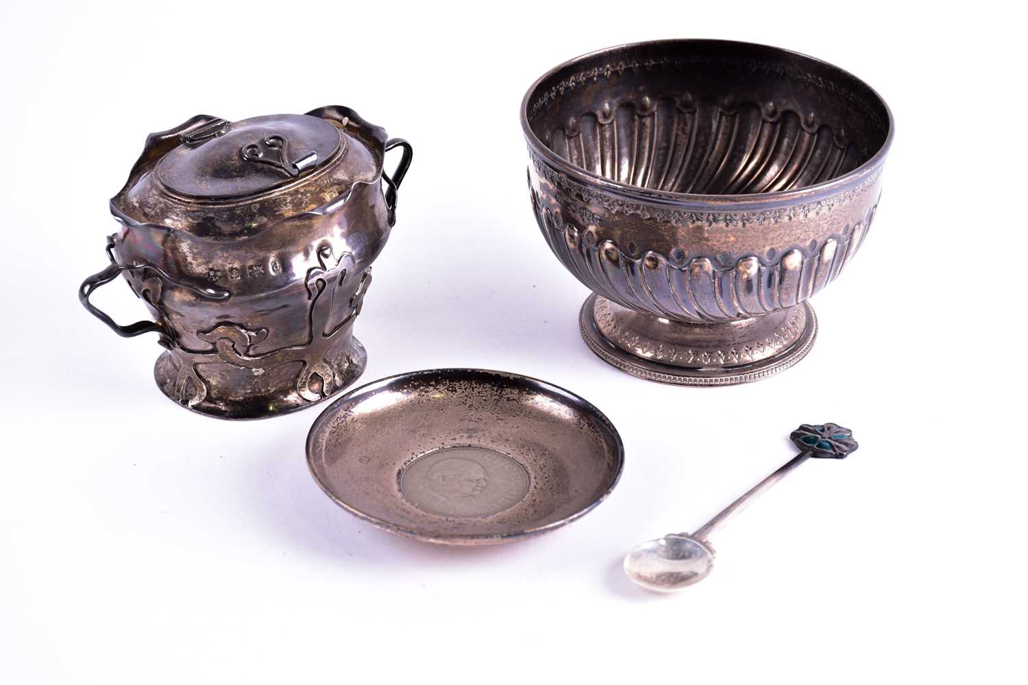 Lot 290 - An Edwardian Arts and Crafts silver two handle...
