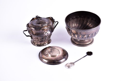 Lot 290 - An Edwardian Arts and Crafts silver two handle...