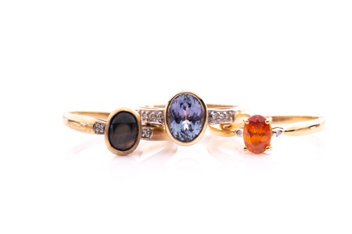 Lot 265 - A 9ct yellow gold and gemstone ring, set with...
