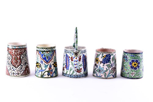 Lot 285 - A collection of Iznik decorated pottery,...