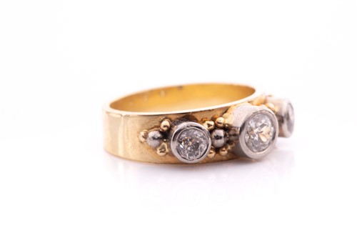 Lot 76 - A yellow metal and diamond ring, collet-set in...