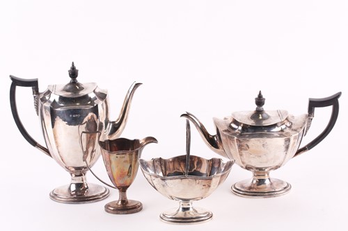 Lot 305 - A George V four-piece silver tea set,...