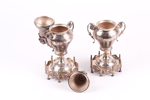 Lot 326 - A pair of Middle Eastern white metal baluster...