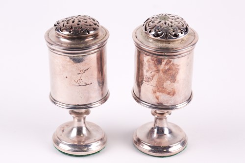 Lot 350 - A pair of Regency silver cylindrical castors,...