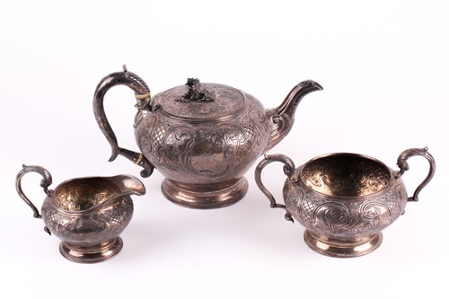 Lot 338 - A George IV three-piece silver teaset, London...