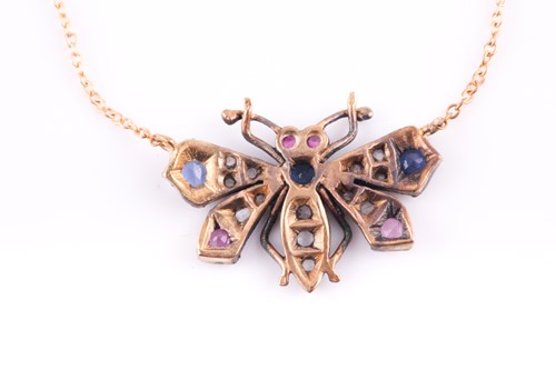 Lot 61 - A diamond and gemstone butterfly pendant, the...
