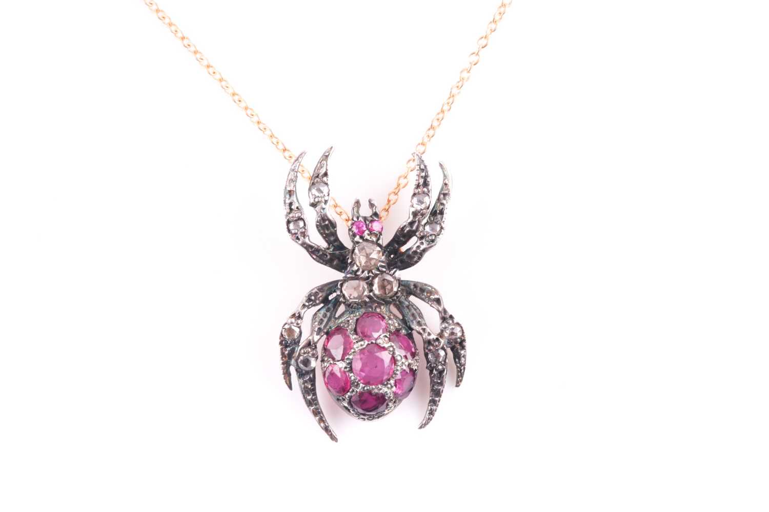 Lot 29 - A silver gilt, diamond, and ruby spider...