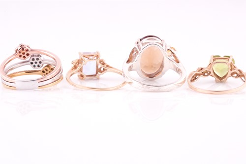 Lot 165 - Four gem set rings, two set in 9 carat gold,...