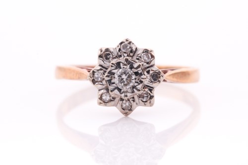 Lot 253 - An 18ct yellow gold and diamond cluster ring,...