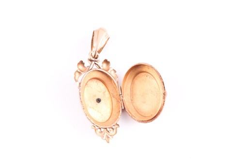 Lot 271 - A Victorian yellow metal and pearl locket, the...