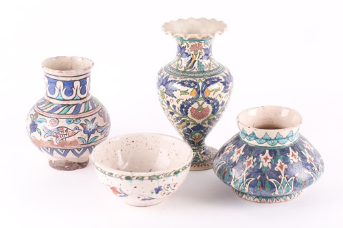 Lot 278 - Four items of Isnik decorated pottery,...