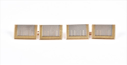 Lot 630 - A pair of 18ct yellow gold cuff links with...