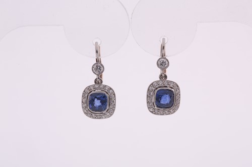 Lot 250 - A pair of diamond and sapphire drop earrings,...