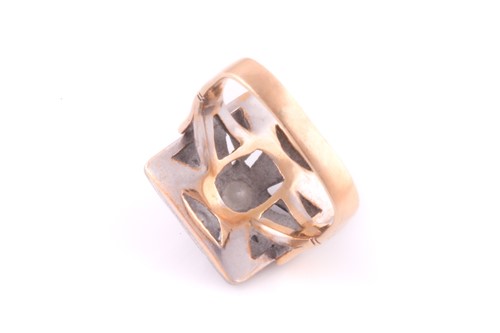 Lot 243 - An Art Deco diamond ring; the nine stone...