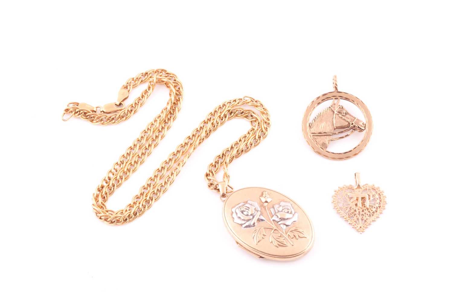 Lot 1 - A two colour 9 carat gold oval locket; with...