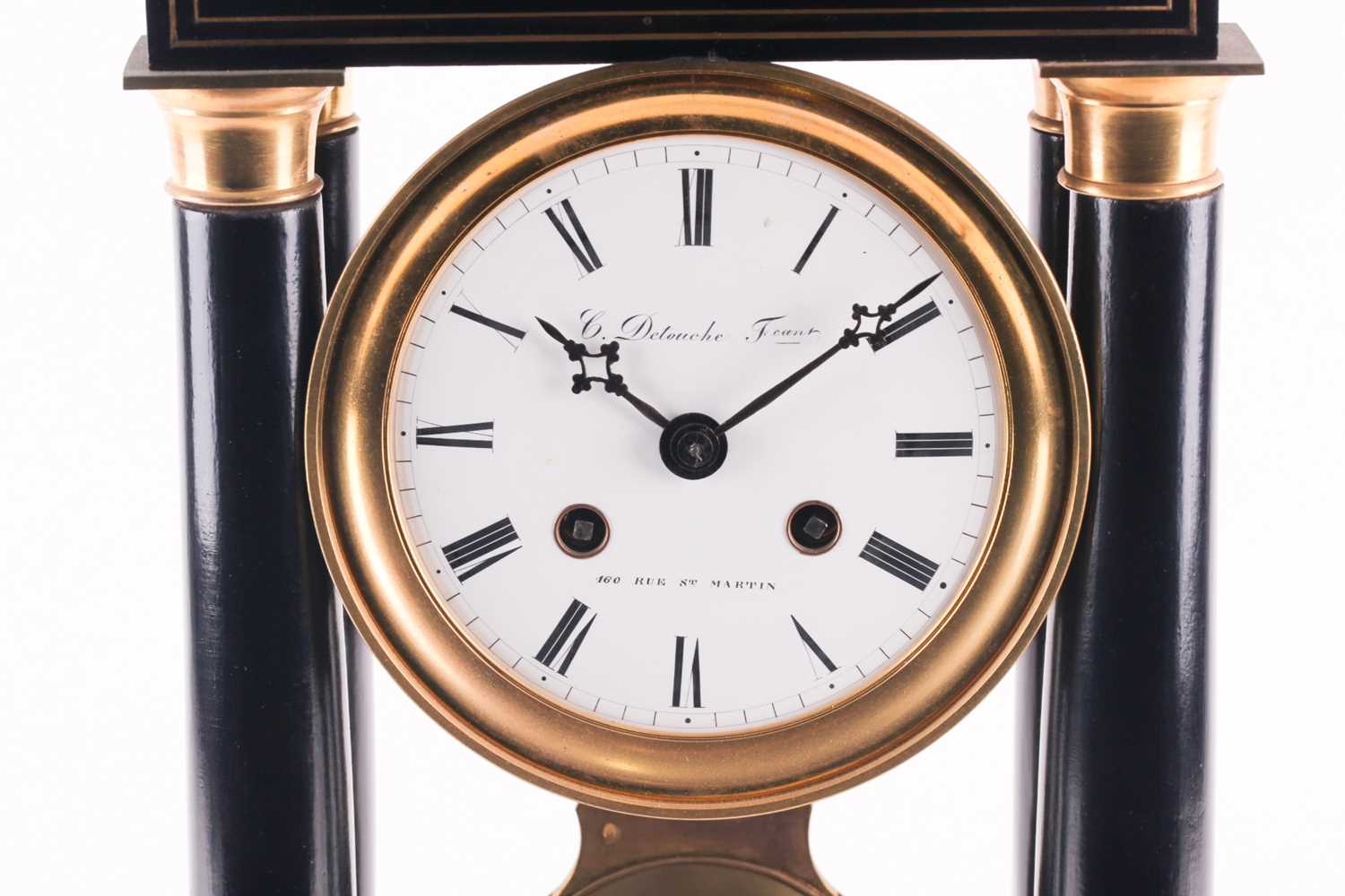 Dechous Clocks Lot 189 - A French portico mantel clock by C. Detouche