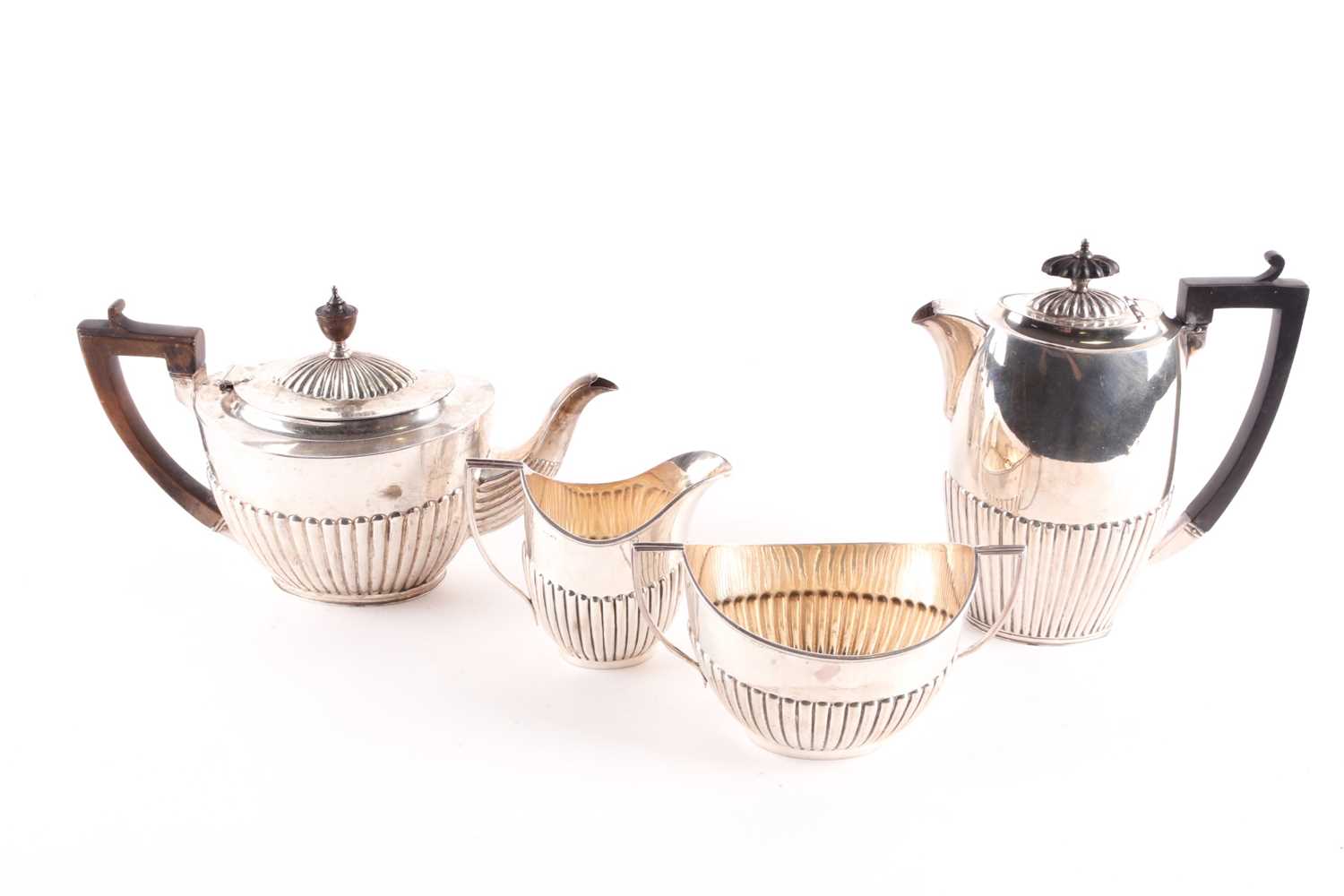 Lot 302 - A matched four piece silver tea and coffee set;...