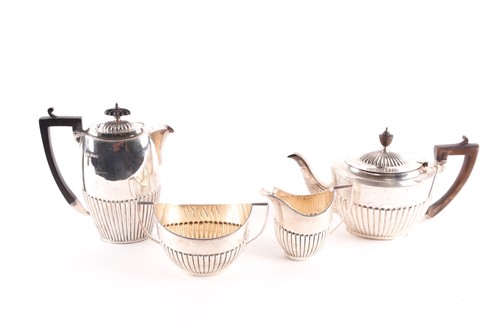 Lot 302 - A matched four piece silver tea and coffee set;...
